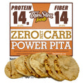 A package of Thin Slim Foods Power Pita displays nutritional information highlighting 14 grams of protein and fiber per pita, with several pita breads arranged in front.