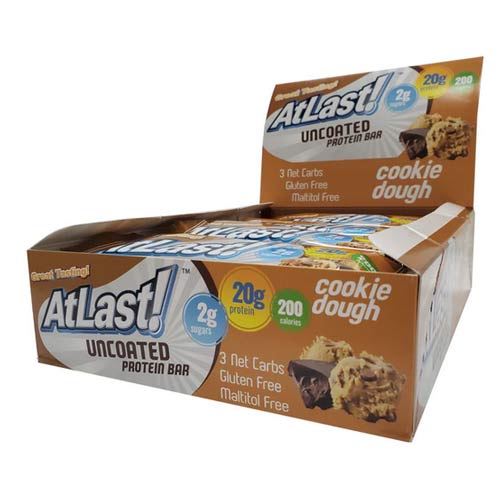 A display box of AtLast! Cookie Dough protein bars.