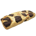 An unwrapped AtLast! Peanut Butter protein bar with chocolate chunks.
