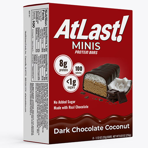 A box of AtLast! Minis Dark Chocolate Coconut protein bars.