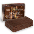 A Scrumptious Double Fudge Brownie beside its wrapper.