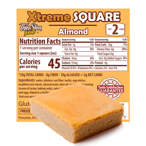 ThinSlim Foods Xtreme Almond Square label behind a square cake.