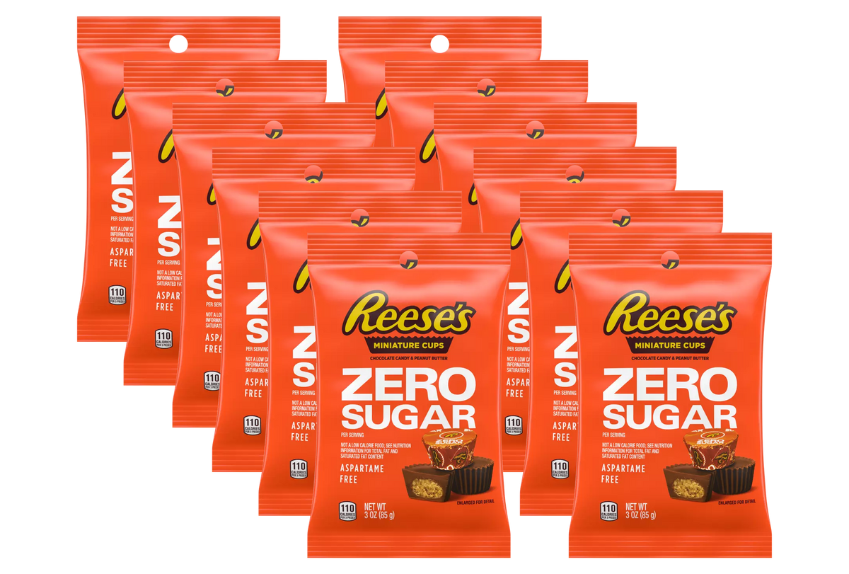 A collection of Reese's Zero Sugar Miniature Cups packages, featuring bright orange wrappers with bold text, showcasing the product's sugar-free and aspartame-free attributes.