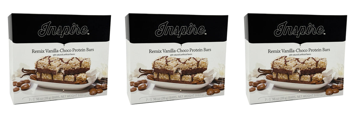 Three boxes of Inspire Remix Vanilla-Choco Protein Bars are displayed, featuring a close-up of the bars on a plate, with coffee beans and vanilla pods in the background.
