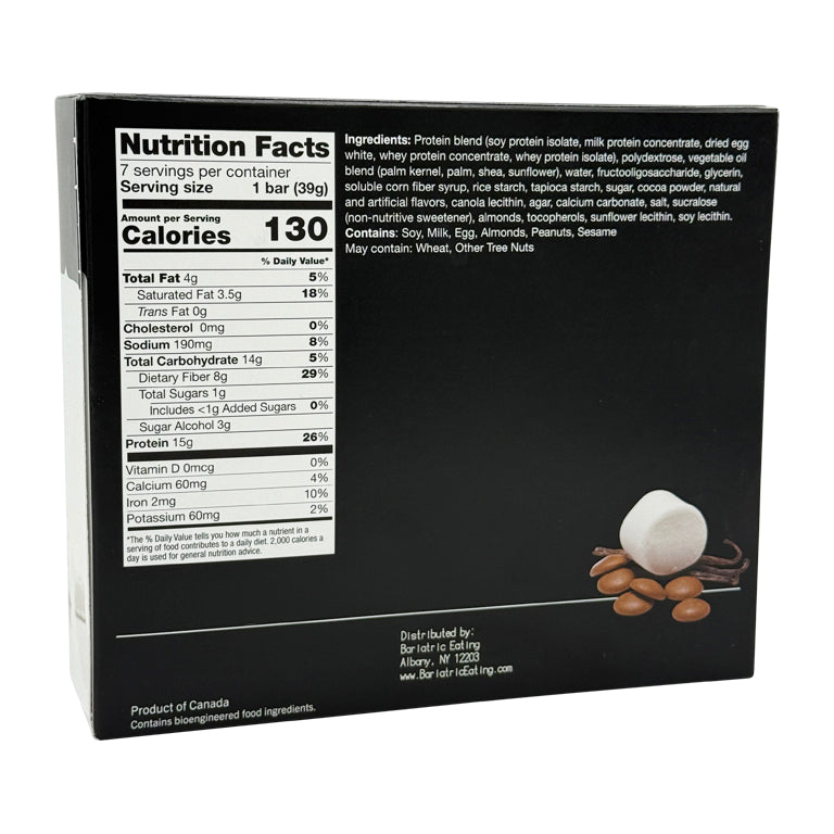 A nutrition facts label on a black box lists ingredients and nutritional information for a protein bar, including calories, fats, carbohydrates, and protein content, with a small image of nuts and marshmallows.