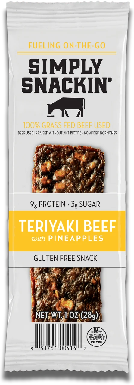 A packaged snack featuring a teriyaki beef jerky bar with pineapple pieces, labeled "Simply Snackin'," highlighting its gluten-free and grass-fed beef qualities.
