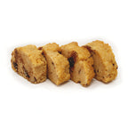Four ThinSlim Foods CooKETOs Chocolate Chip Biscotti Bites on a white background.