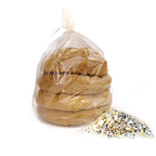 A bag of ThinSlim Foods Gluten Free Everything Rolls beside a pile of seeds.