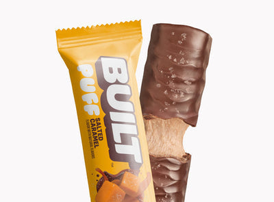 Front package of Built Bar Protein Puffs, Salted Caramel / One Bar