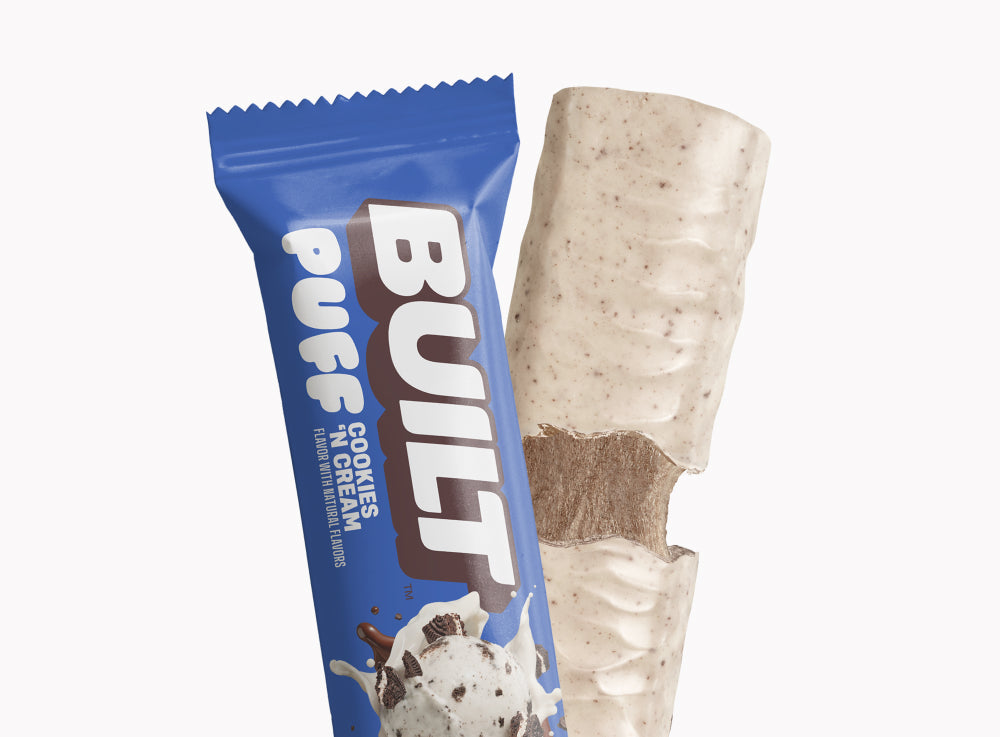 Front package of Built Bar Protein Puffs, Cookies 'N Cream / One Bar