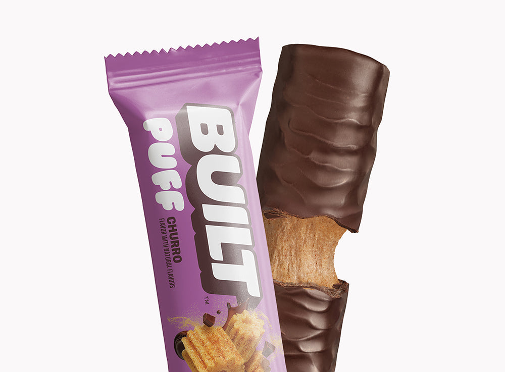 Front package of Built Bar Protein Puffs, Churro / One Bar