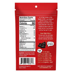 The back of a red snack packaging displays nutrition facts, ingredients, and a personal message from the founder, promoting guilt-free mini chocolate chips suitable for baking.